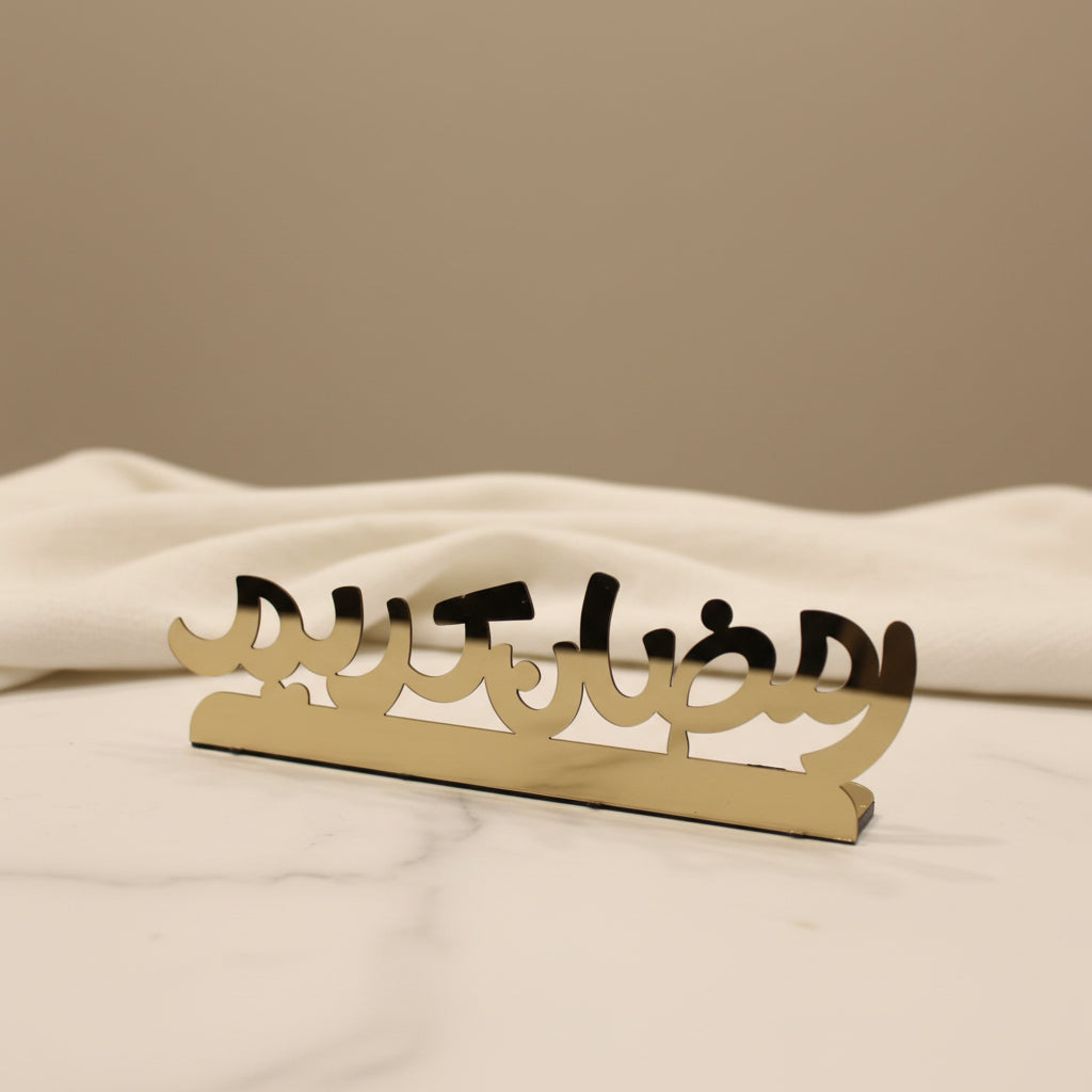 Metallic decorative item on a marble surface